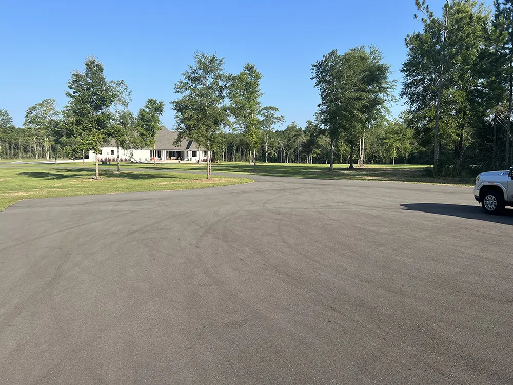 picture of residential asphalt before seal coating by Image Striping Company